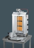 Das Gerät steht eingeschaltet auf der Abbildung auf einem kleinen Edelstahl-Tisch und ist von vorne zu sehen. Der Hintergrund Das Gerät steht eingeschaltet auf der Abbildung auf einem kleinen Edelstahl-Tisch und ist von vorne zu sehen. Der Hintergrund ist ein Verlauf aus mehreren dunklen Grautönen.